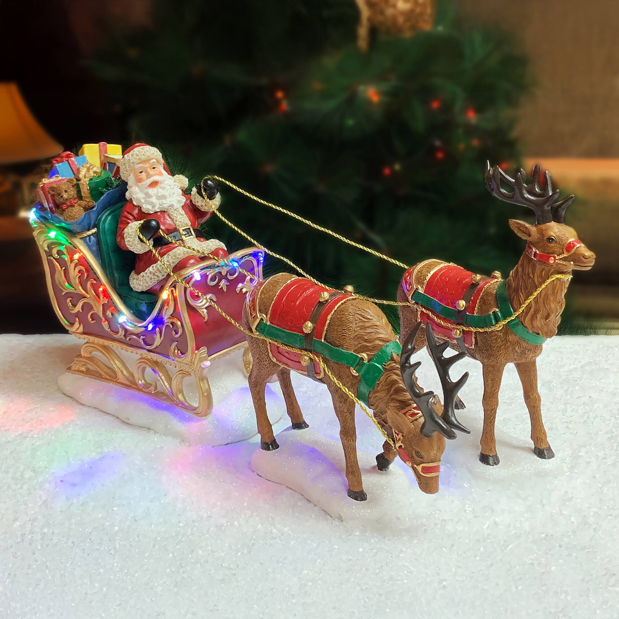 Moments in Time 9.5" Santa Riding Sleigh with Reindeers Décor